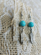 Turquoise beaded feather earrings