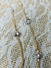 Sparkling crystals on gold chain