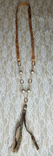 Leather and pearls tassel necklace