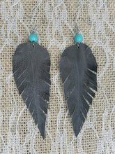 Long grey feather earrings