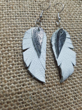 White leather feather earrings