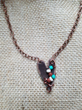 Wrapped around my heart necklace