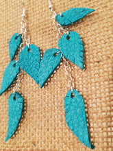 Turquoise leather feather dangle earrings