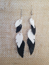 Black and white leather feather earrings