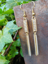 Gold chain tassel earrings