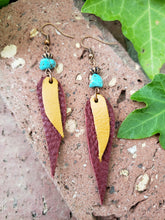 Cranberry layered feather earrings