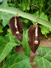 Crystal accent brown feather earrings