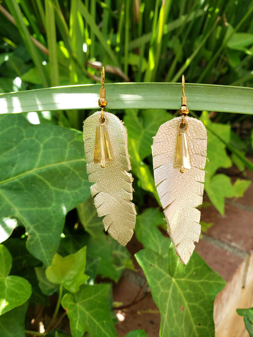 Crystal drop gold feather earrings
