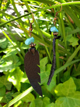 Black leather feather dangle earrings