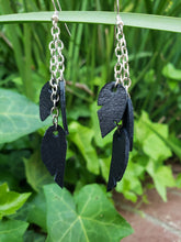 Black feather chain dangle earrings