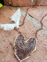 Brown tooled leather heart necklace