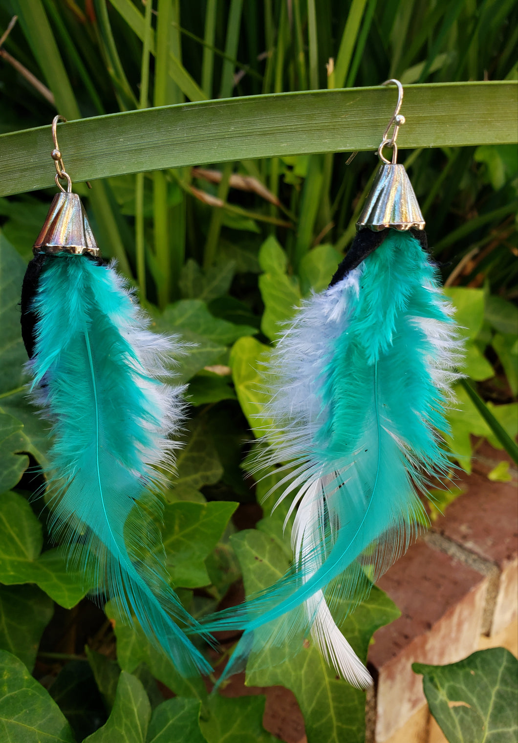 Tropical teal feather earrings
