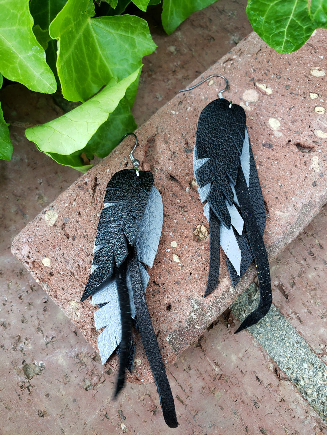 Black and grey layered feather earrings