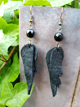 Black on black layered feather earrings
