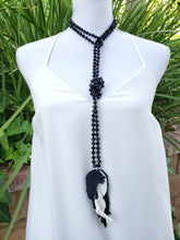 Black feather necklace