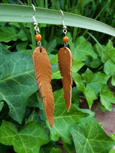Long n lean tan feather earrings