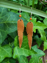 Long n lean tan feather earrings