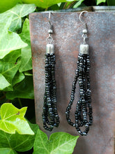 Black seed bead tassel earrings