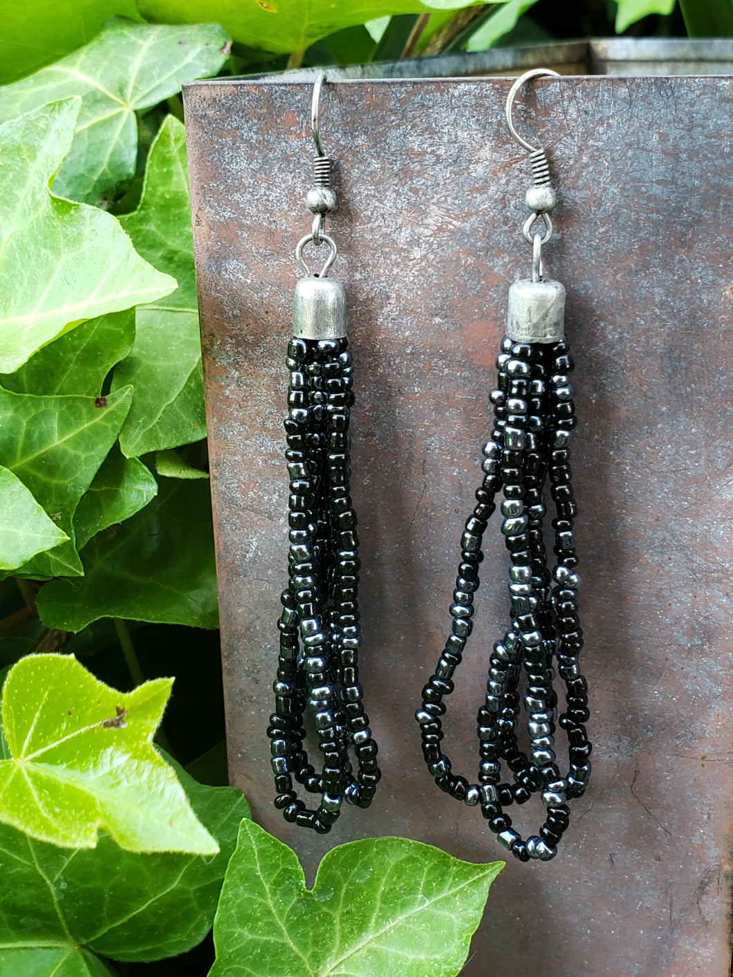 Black seed bead tassel earrings