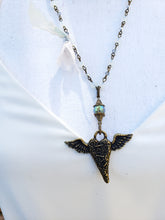 Winged mended heart necklace
