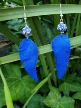 Brilliant blue feather earrings