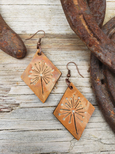 Dandelion tooled leather earrings