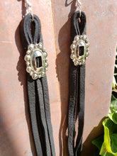 Jet black leather concho tassel earrings