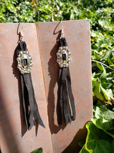Black leather concho tassel earrings