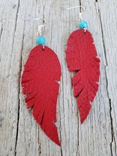 Red buckskin feather earrings